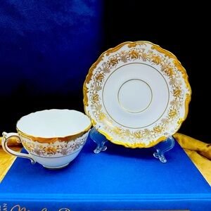 Coalport Hazelton White tea cup and saucer with gold decoration